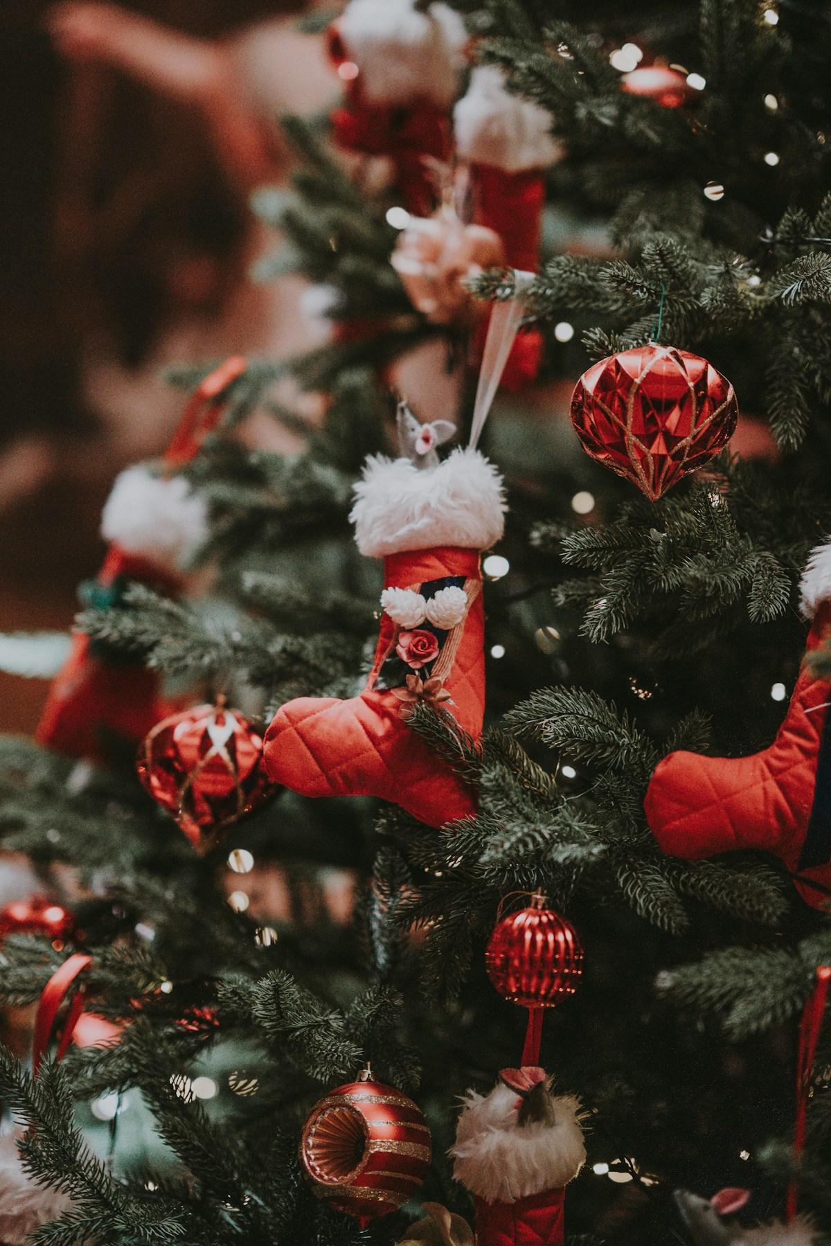 A real evergreen Christmas tree decorated with glass ornaments